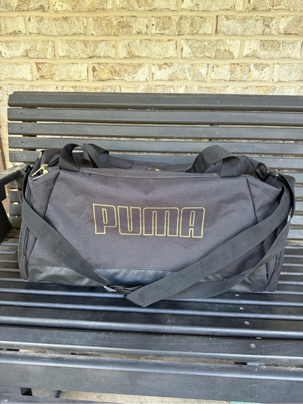 Puma Black Duffel Bag with Gold Logo